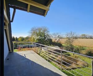 REZERVOVANÉ- RD s krásnou záhradou a dvojgarážou – Chynorany